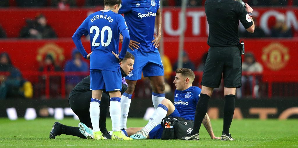 Everton fans react to Digne injury during Manchester United clash