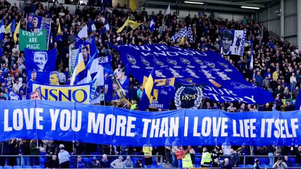 Everton Multi-Academy Trust: Everton supporters displaying large banners in the stands at Goodison Park